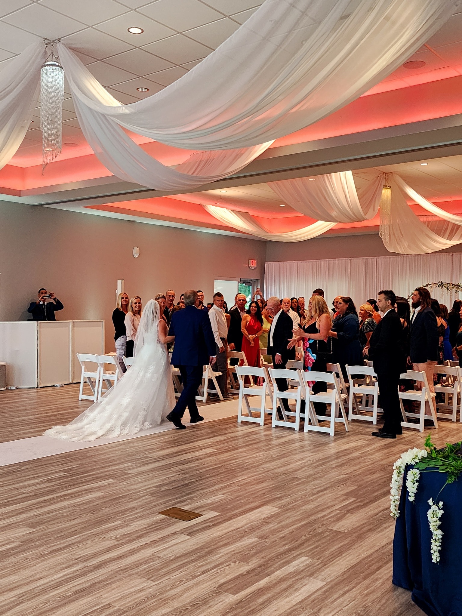 Team House Tampa wedding ceremony aisle with floral decor